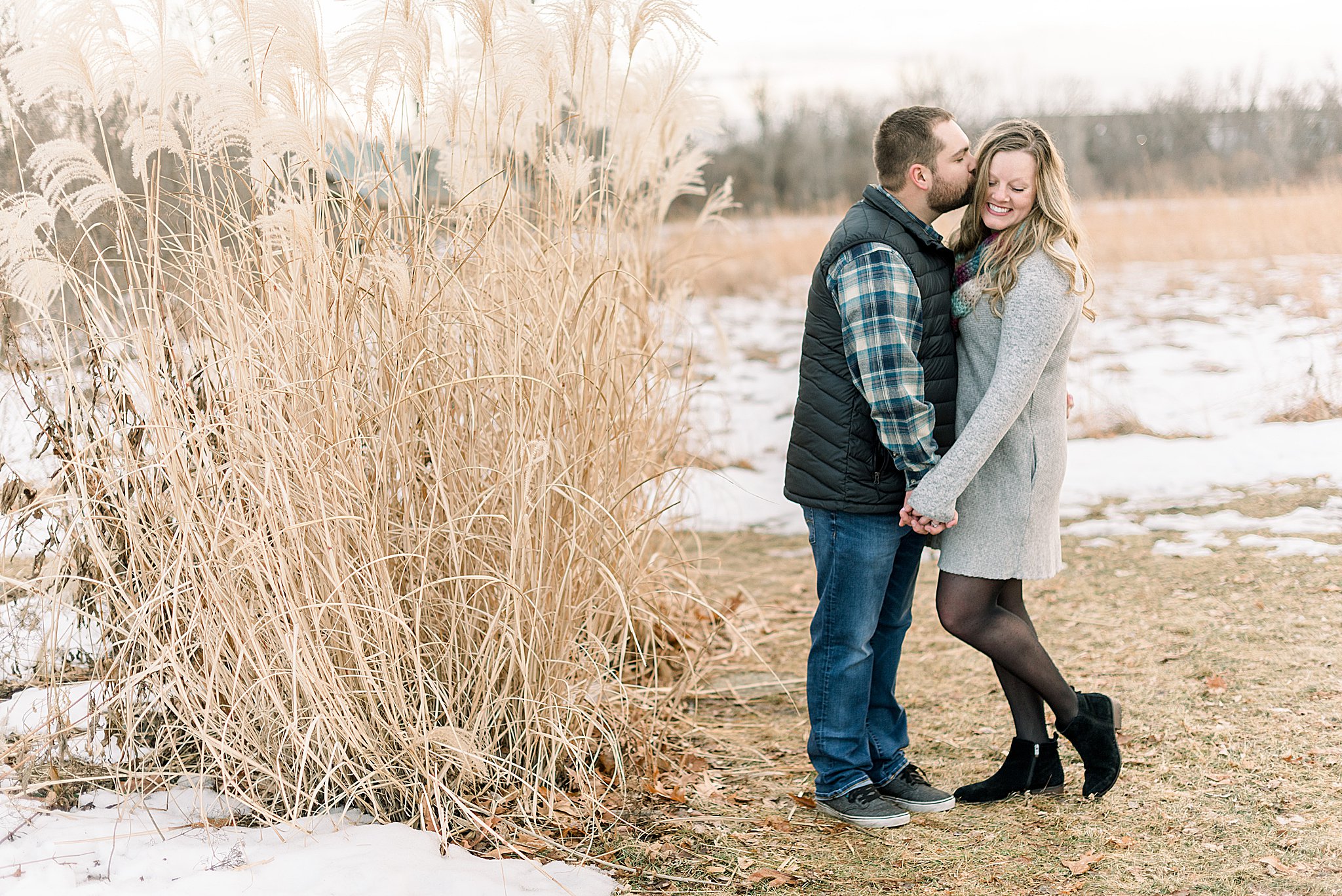 couple smiling during engagement session