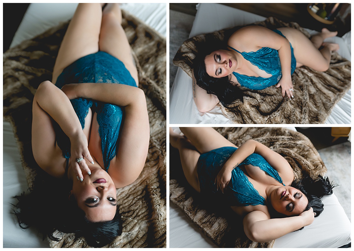 Woman lays on bed in blue for South Dakota Boudoir Photographer