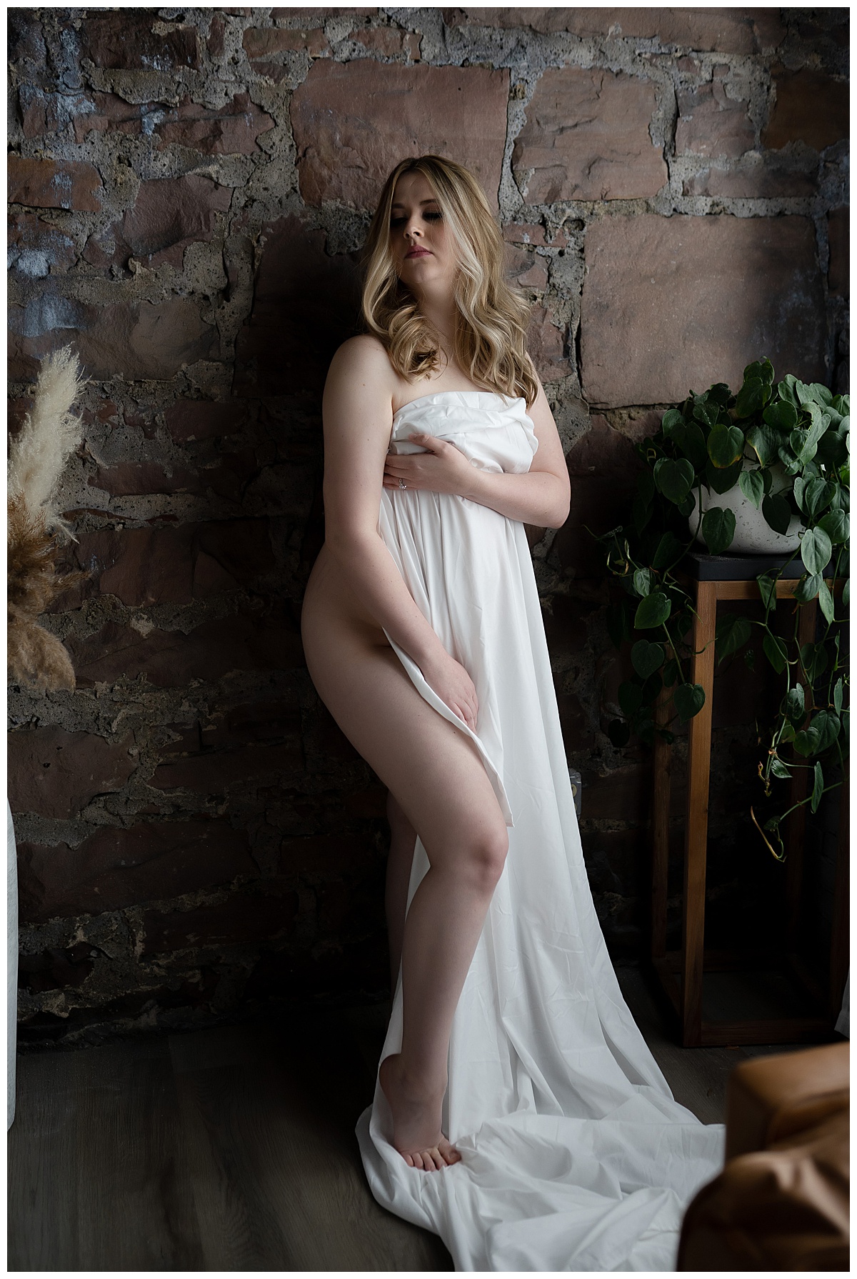 Adult wrapped in white linen for Emma Christine Photography