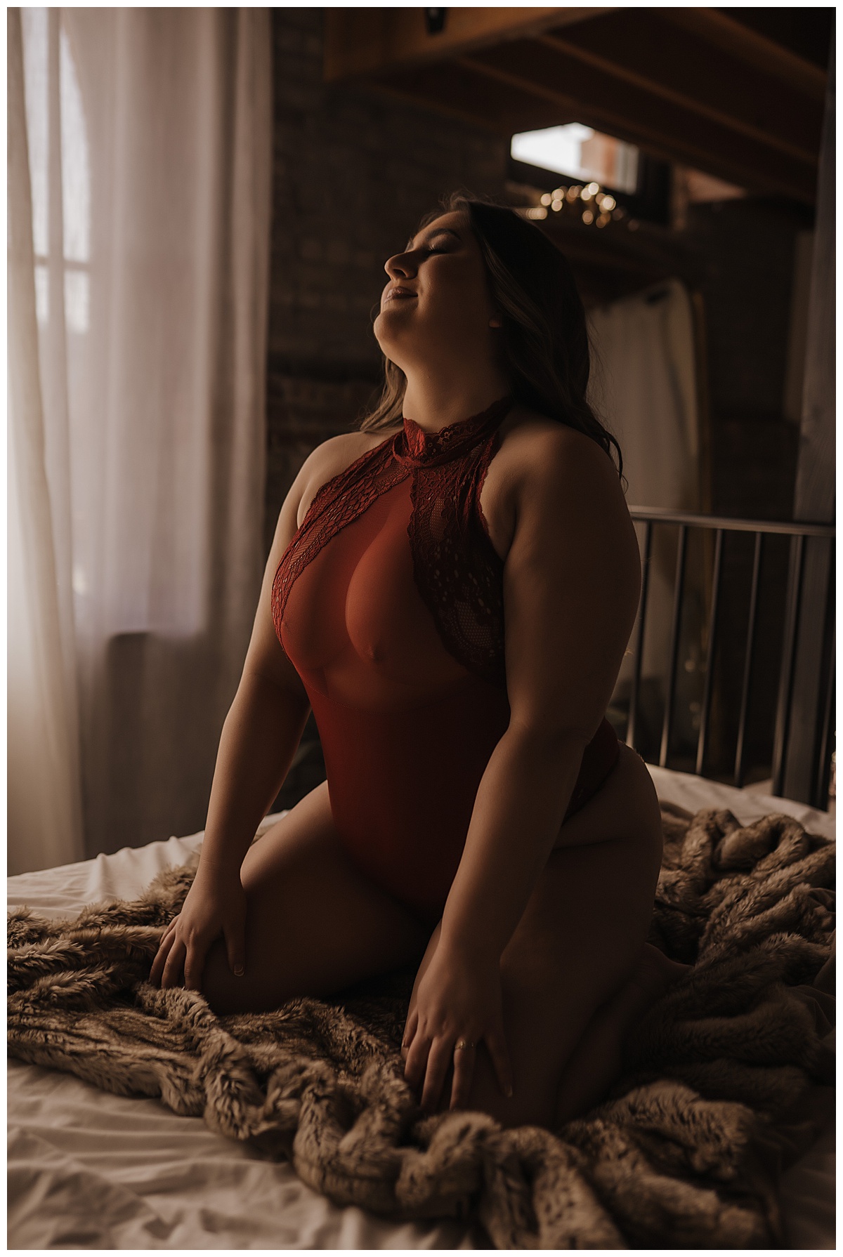 Lady kneels in red lingerie for Emma Christine Photography