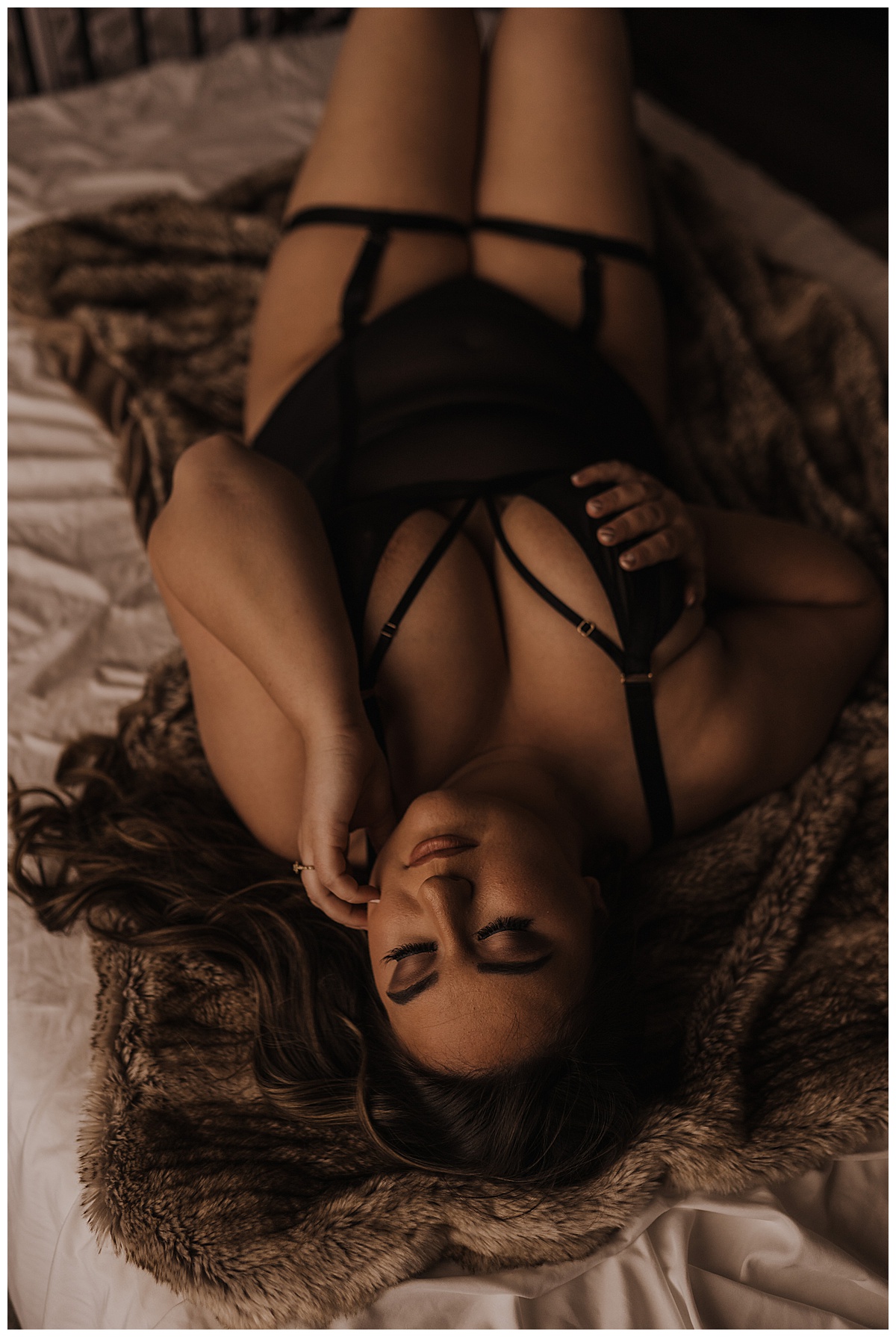Woman wears black lingerie from one of the perfect Places to Buy Lingerie For Your Boudoir Session 
