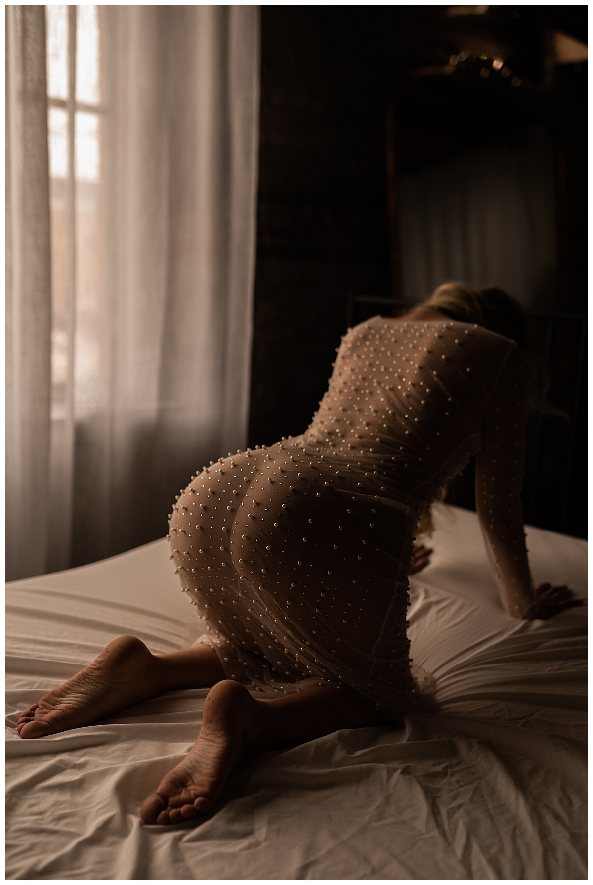 Woman wear mesh dress after Using A Veil For Your Boudoir Session