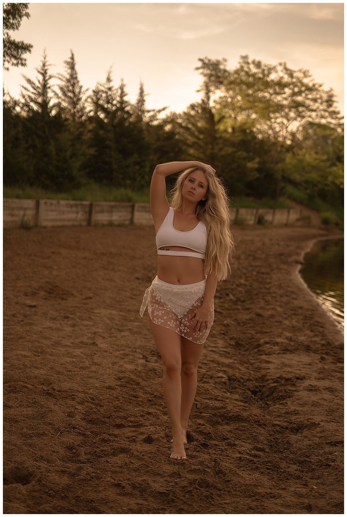 Female walks in the sand for Emma Christine Photography