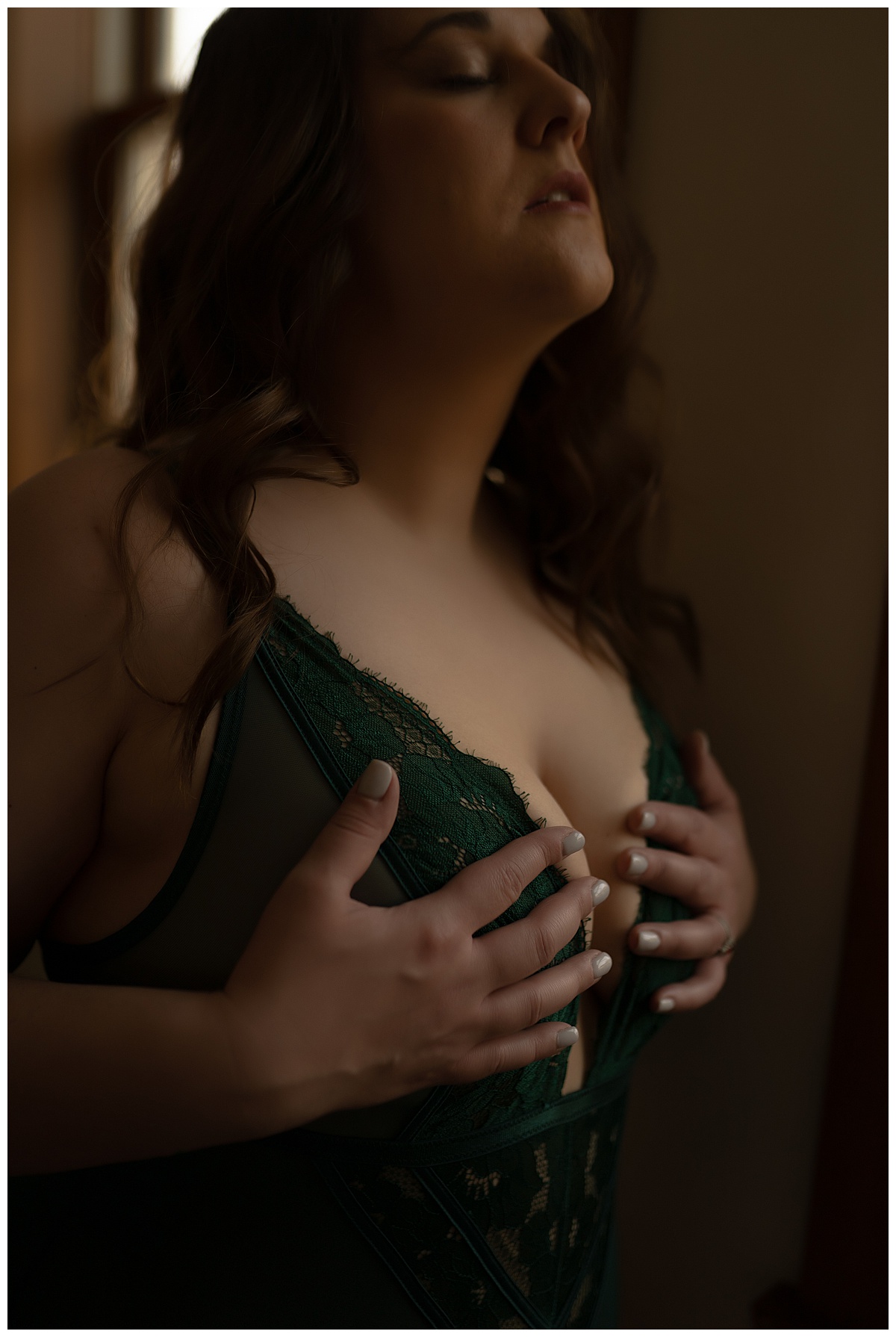 Woman covers chest for Emma Christine Photography
