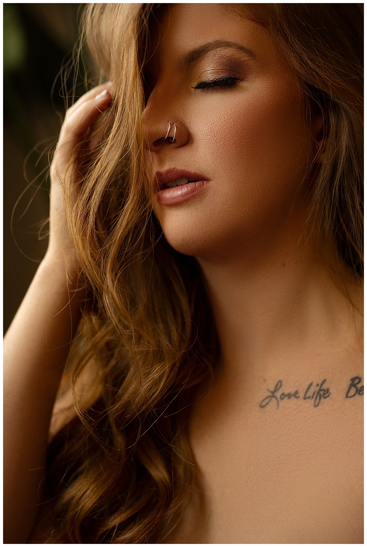 Adult shows off her stunning makeup for Sioux Falls Boudoir Photographer