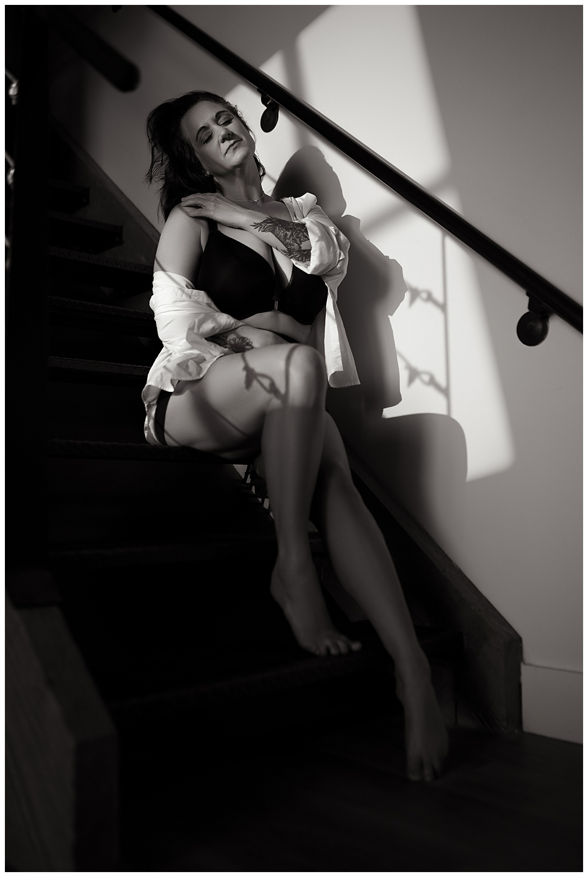  Person sits on steps for Sioux Falls Boudoir Photographer