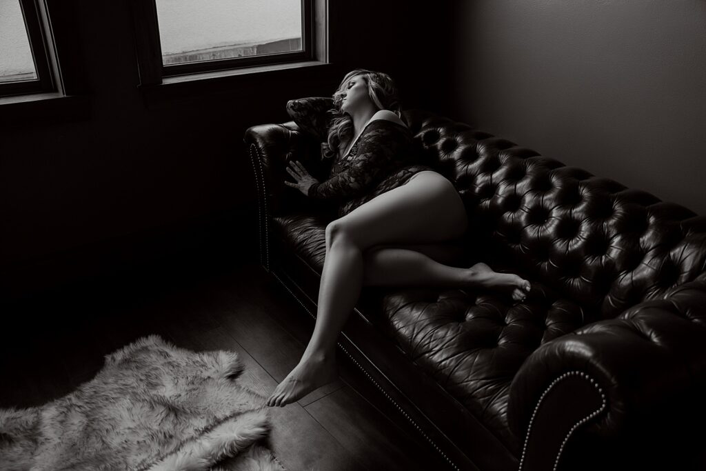 Woman lays on the couch for Emma Christine Photography