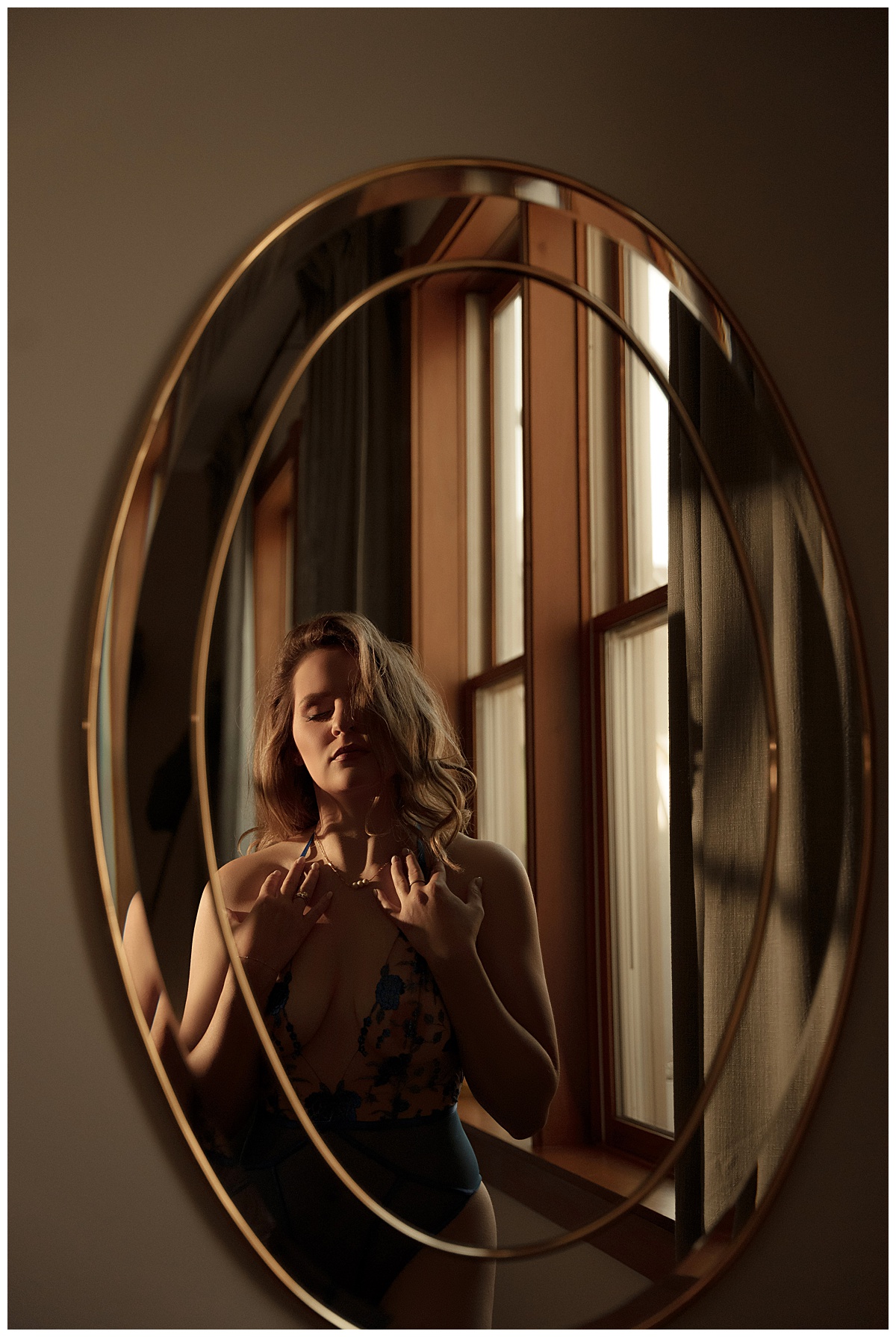 Person stands in front of the mirror for Emma Christine Photography